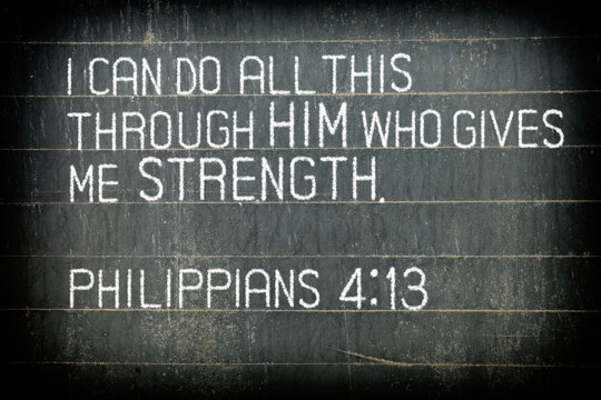 The Bible verse Philippians 4:13 on chalkboard.