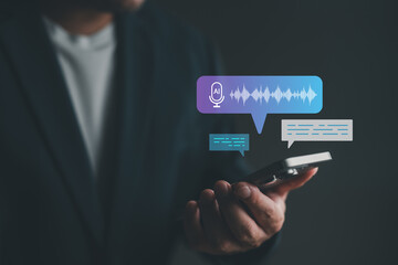 Man using AI voice assistant on smartphone with speech-to-text conversion and chatbot interface,...
