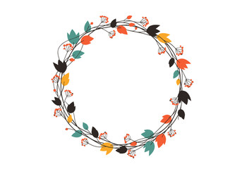 Decorative round wreath with autumnal leaves and small berries in warm and cool tones