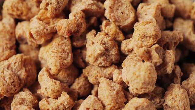 Dried soy meat pieces. Textured vegetable protein. Healthy eating. Vegan food. High quality 4k footage