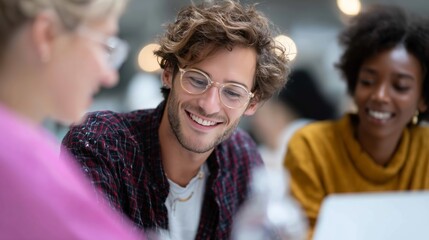 Participants engage in a lively discussion during a collaborative workshop at a creative workspace in the afternoon