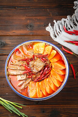 Spicy Chongqing Hot Pot with Blood Sausage and Wontons - Traditional Chinese Cuisine
