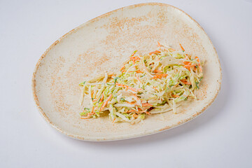 Colorful coleslaw prepared with fresh vegetables creates a vibrant addition to meals