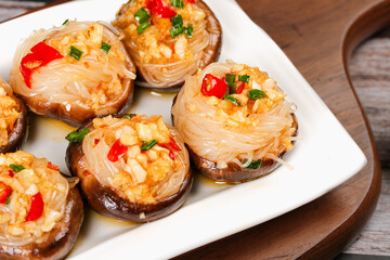 Homemade Stuffed Mushrooms with Glass Noodles and Vegetables on White Plate - Asian Teppanyaki Style Appetizer
