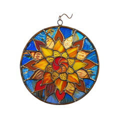 Colorful stained glass sun catcher with intricate flower design hanging against a bright background