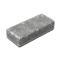 A rectangular, textured, gray item with speckled white markings, displayed against a black backdrop.