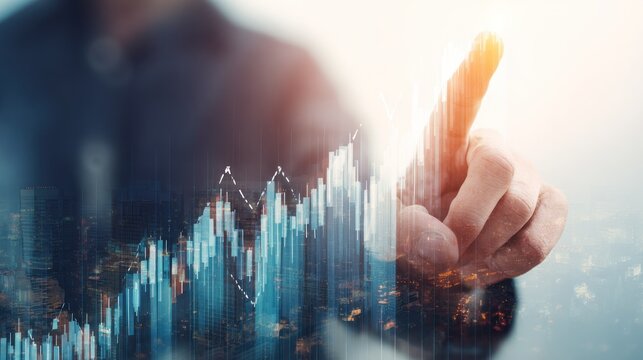 Man's hand interacting with a glowing financial graph overlayed with a blurred cityscape