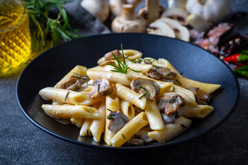 Penne pasta with creamy mushroom sauce