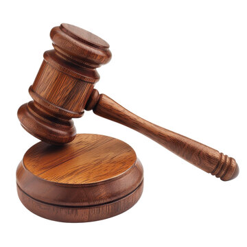 Gavel resting on a wooden block symbolizing justice in a courtroom setting