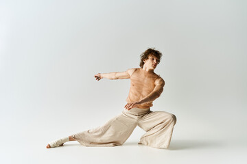 Obraz premium Young dancer expresses creativity through movement in a studio setting