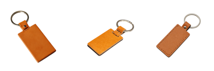 Stylish leather keychains on transparent background product photography minimalist style