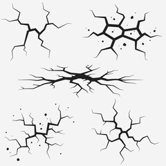 A black and white image of a crack in the ground with rocks and debris.