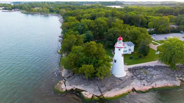 A dynamic rotating shot around Marblehead Lighthouse in Port Clinton, Ohio, with views of Cedar Point and Sandusky Bay.