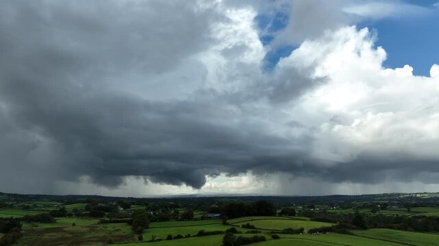 Dramatic thunderstorm rotating over irish countryside