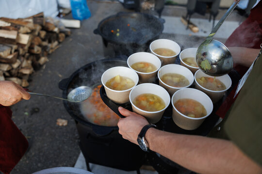 Offering Warm and Delicious Soup Served in EcoFriendly Cups for Everyone to Enjoy Together