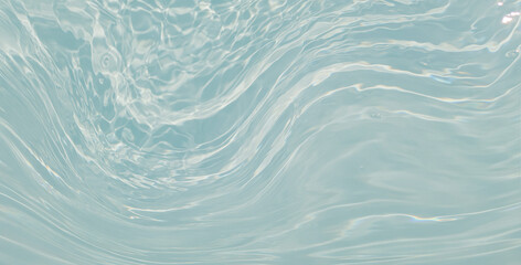 Obraz premium Serene, light-blue image of rippling water. Surface features subtle swirls and gentle waves tranquil abstract pattern. Lighting highlights transparent quality of water and undulating textures
