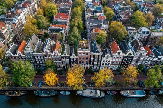 Canal houses, autumn colors, aerial view - Powered by Adobe