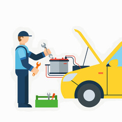 Mechanic working on a car battery with tools and a toolbox.