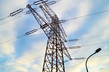 Electricity Transmission Tower with Context on Rising Electricity Costs in Poland.  Photo of a tall...