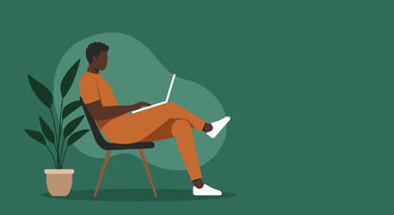 Young Black man casually works on his laptop from home, embodying remote work and a modern digital lifestyle. Ideal for business, education, or freelance concepts.