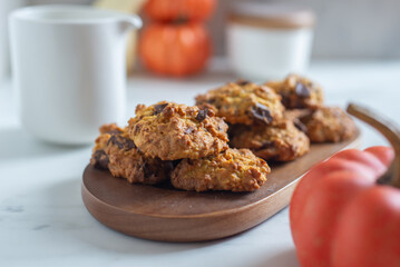pumpkin chocolate chip cookies on a table