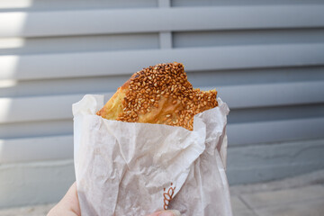 Traditional Greek tiropita, a delicious hot cheese pie made with puff pastry and feta cheese,...