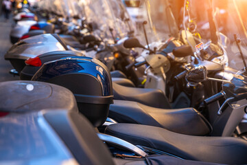 Row of many motorcycle. Motorcycles group parking on city street during adventure journey....