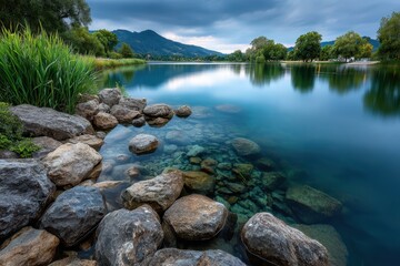 Fototapeta premium Serene Lake with Crystal Clear Water and Rocks