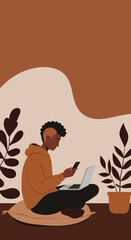 Young man working remotely with a laptop and smartphone, comfortably seated at home. Ideal for concepts of productivity, online learning, or digital lifestyle.