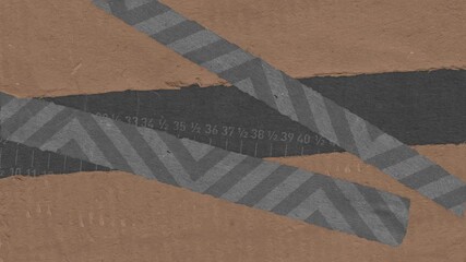 Textured paper composition with ruler marks and decorative striped grey tape overlapping brown and dark grey surfaces - Powered by Adobe