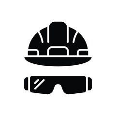 Black silhouette icon of hard hat and safety glasses