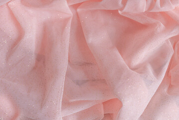 Pink fabric texture draped background.
