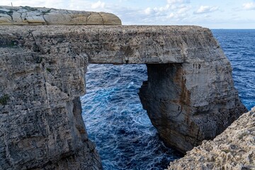Azure Window's natural limestone arch in Gozo, Malta.