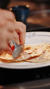 A plate of food with a white plate and a blue border with the words...