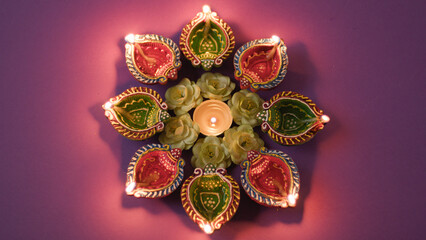 Traditional Diwali candles with colorful decorations