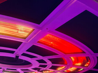 Futuristic design,  concentric rings and radial segments illuminated with LED panels