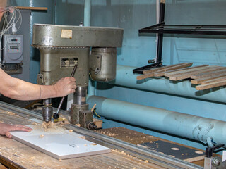 Industrial Drill Press in Active Use