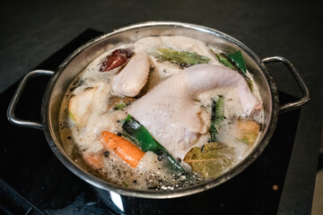 Homemade chicken soup served in a bowl