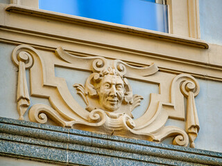 A highly expressive relief on a building in Turin, Italy.