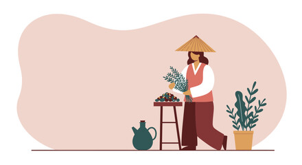 Woman in a traditional conical hat gathers fresh herbs, standing by a rustic stall with natural produce. Ideal for health, culture, or agricultural themes.