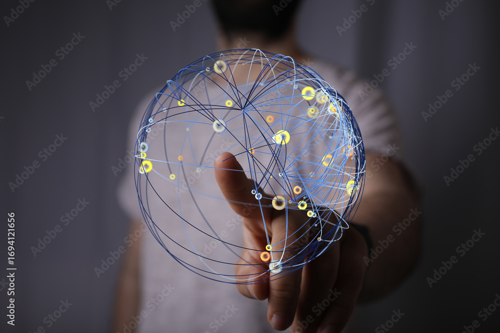 Aufkleber hand interacts with a digital globe, showcasing global network connections and data visualization.