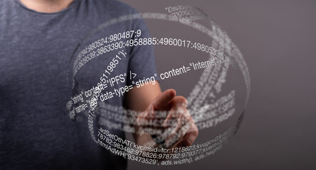 A person interacts with a futuristic digital interface, showcasing lines of code and data.