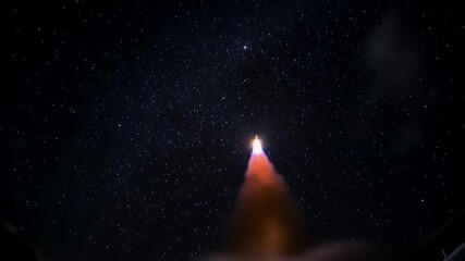 Rocket launching at night against a backdrop of stars, leaving a brilliant trail