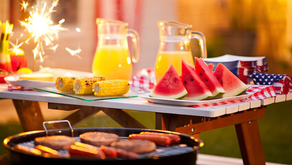 Outdoor summer barbecue with grilled burgers and hot dogs refreshing watermelon slices corn on the cob and sparkling fireworks in the background perfect for fourth of july celebrations