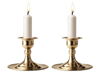 Two gold-toned candle holders with lit white candles