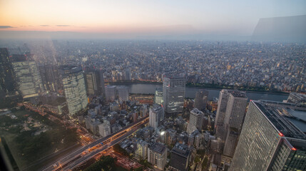Obraz premium 夜明けの未来型メガシティ俯瞰スカイライン / Aerial Futuristic Megacity Skyline at Dawn