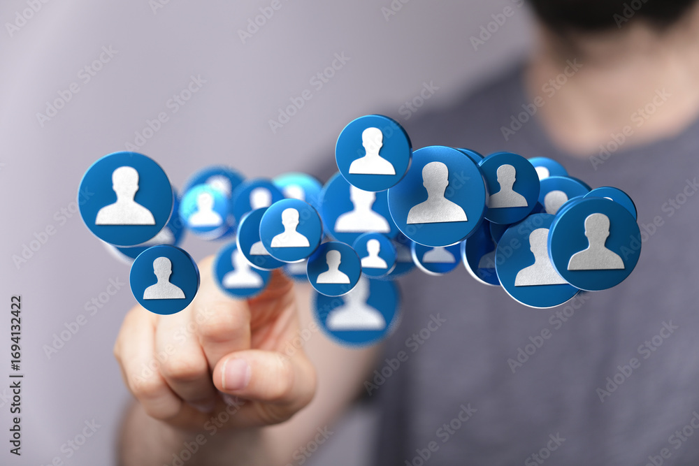 Aufkleber hand interacting with digital icons representing social connections and networking.