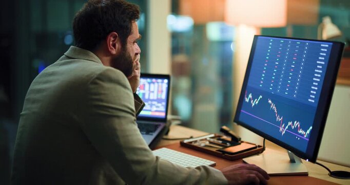 Frustrated man, night and stock market with computer screen for fail, bad investment or decrease. Businessman, broker or working late with technology display, graph or chart for trading in workplace