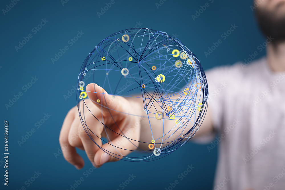 Poster hand interacting with a digital sphere, representing global connectivity and data flow.