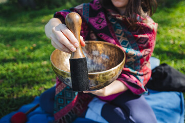 Engage in a mindfulness practice using a Tibetan Singing Bowl while immersing yourself in the...